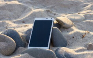 Phone on beach